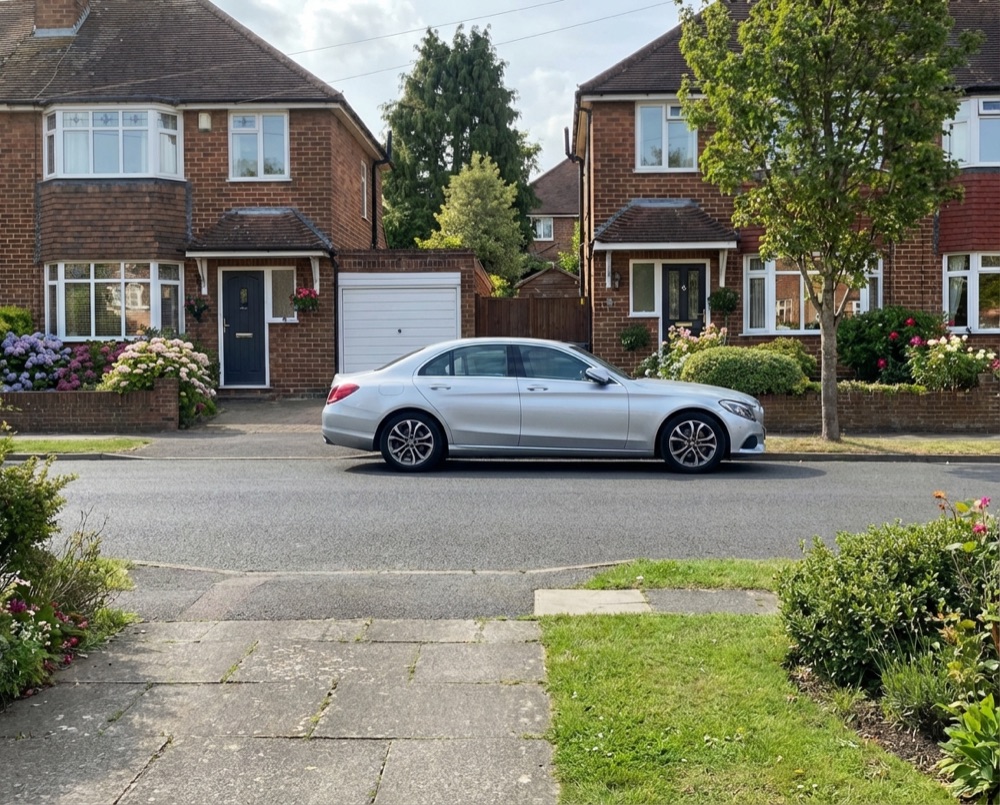 Residential street in Worthing with wheelie bins